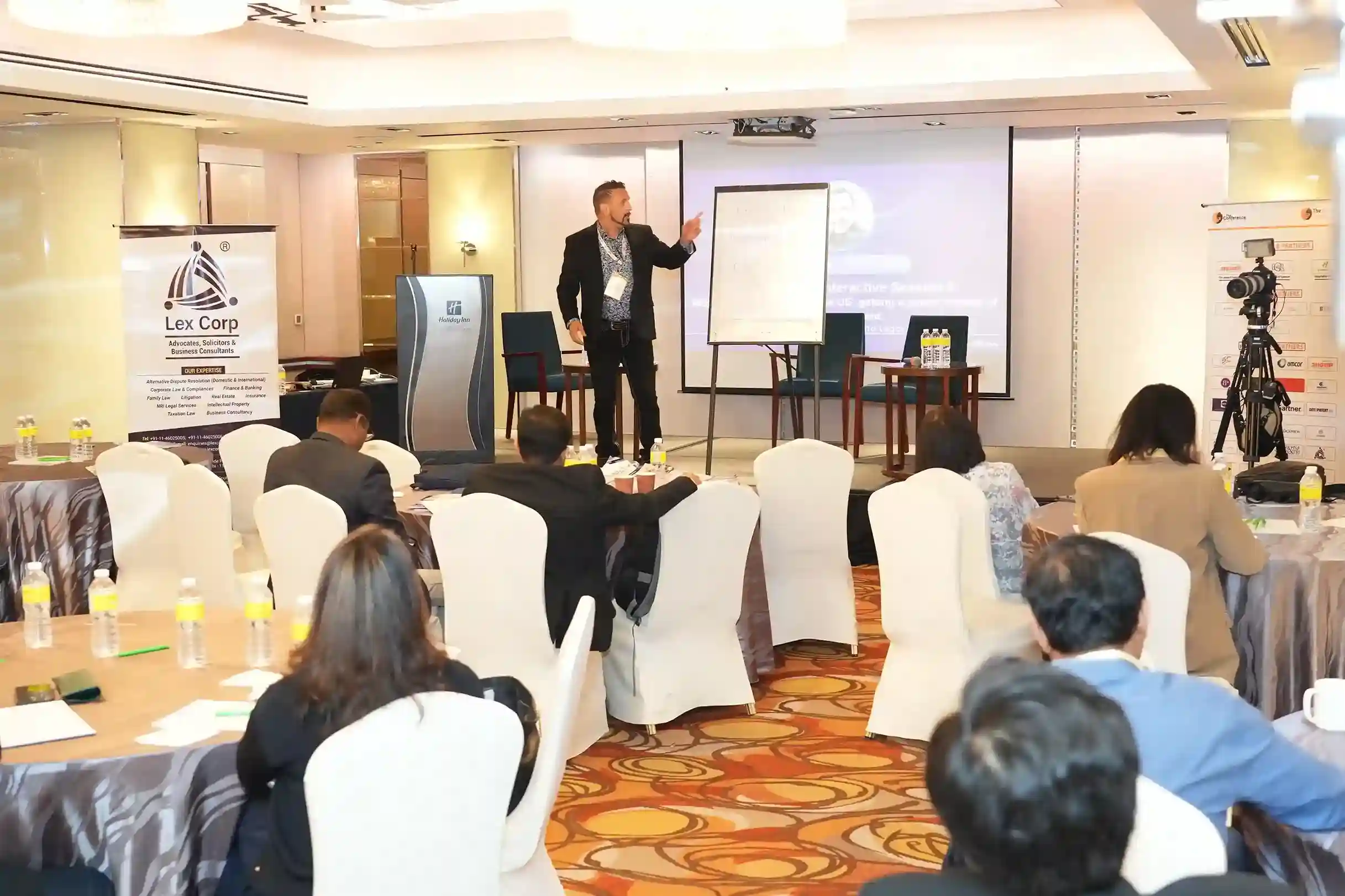 presenter speaking to a group of people